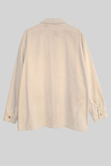 Beige jacket on a light gray background